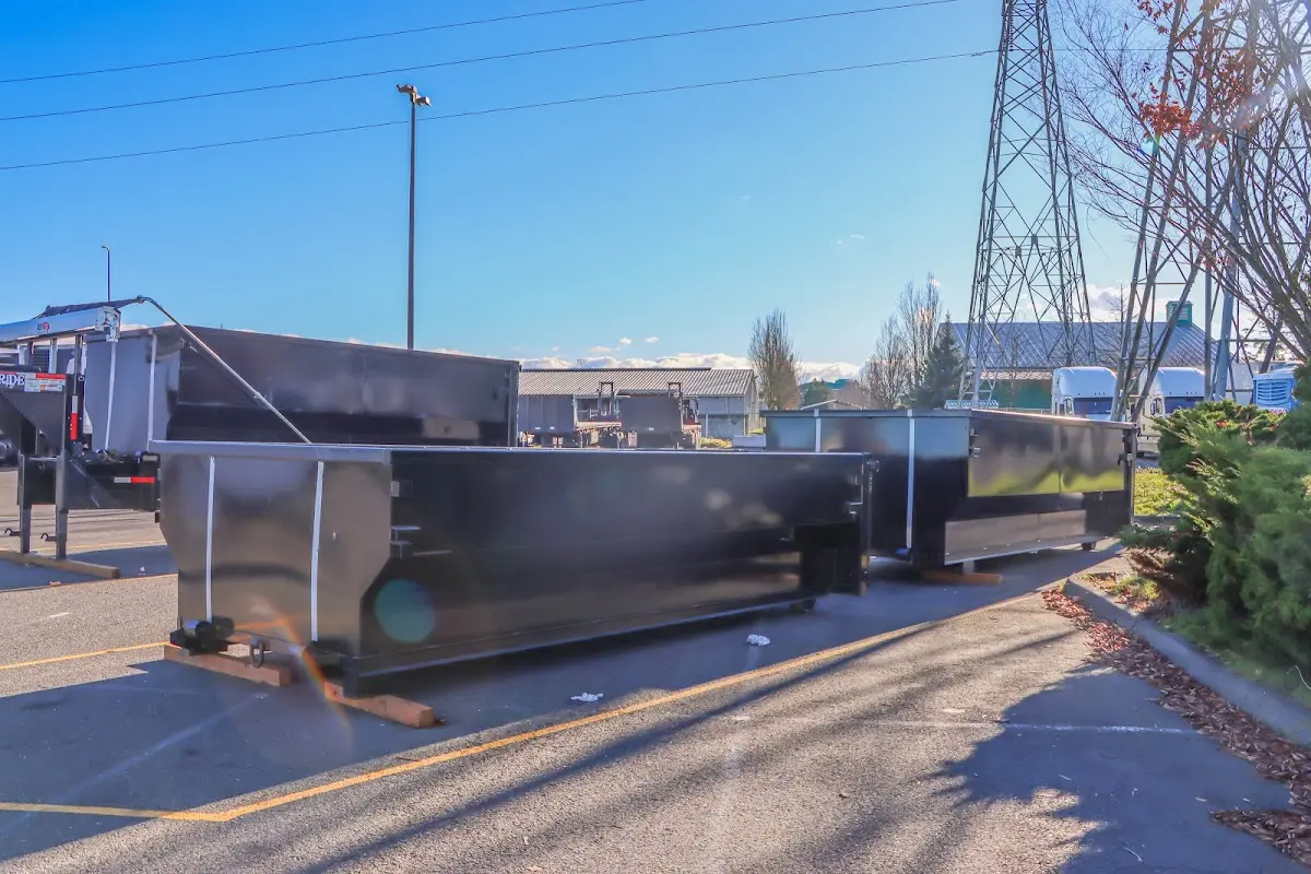 Roll-off dumpster ready for waste disposal at job site for Roofing Dumpster Rental in Derby